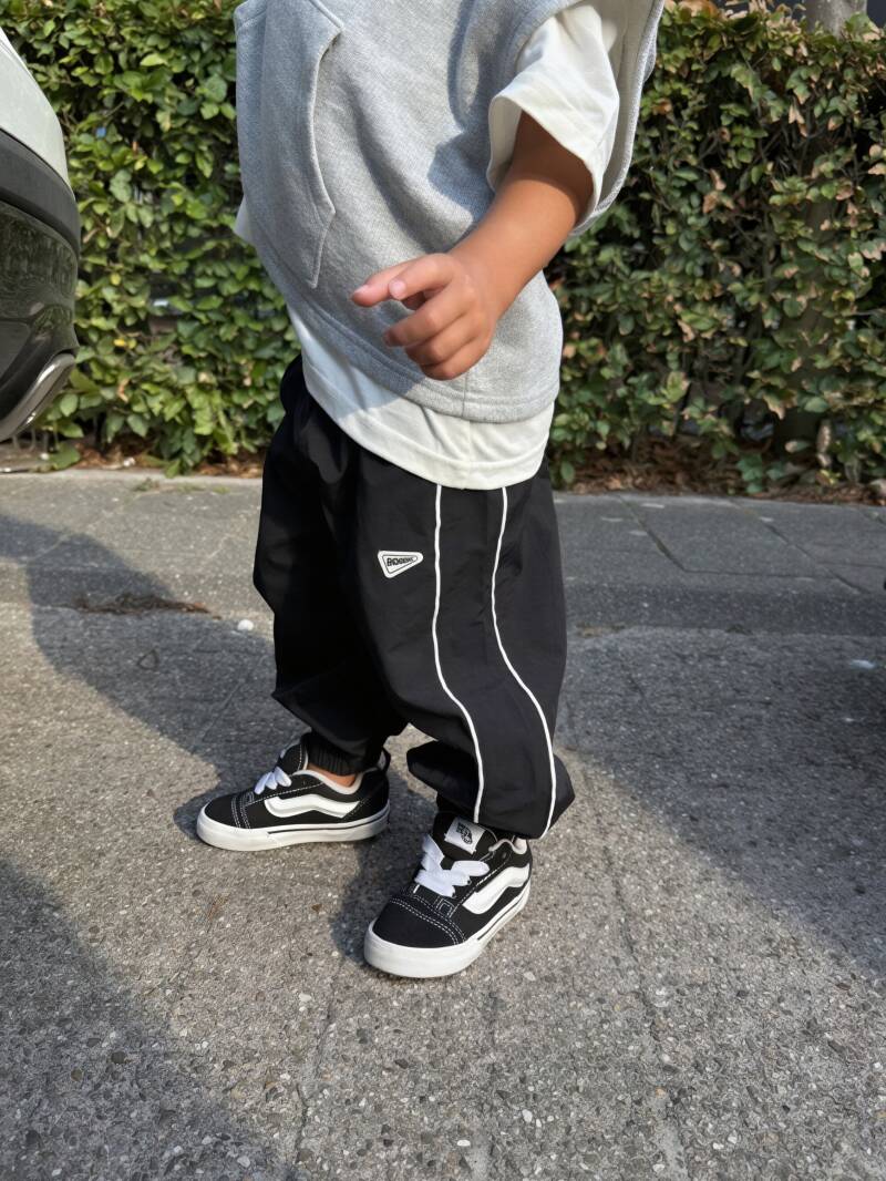 Black parachute pants